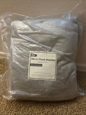 New in plastic! Micro plush blanket.